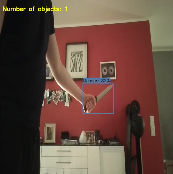 Live camera frame showing one knife detected with an 82 percent displayed confidence score